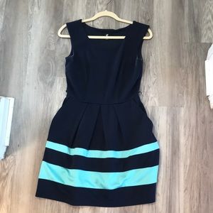 Navy dress with teal bottom stripes. Size S.